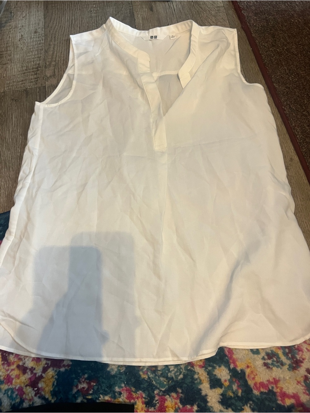 Uniqlo Sleeveless White V-Neck Blouse